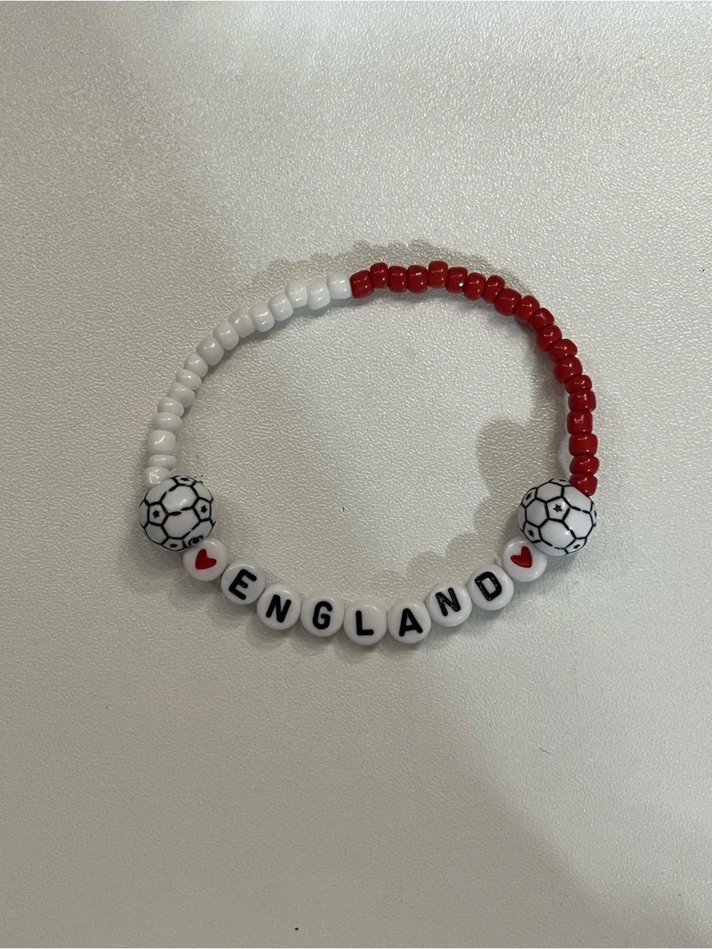 Red and White ENGLAND Beaded Bracelet